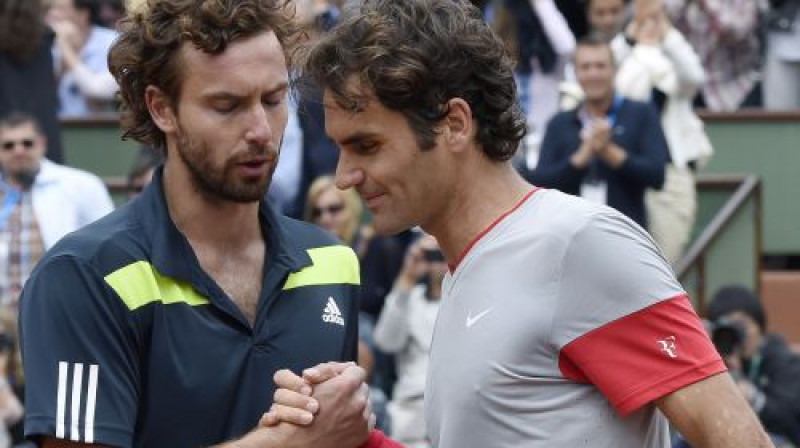 Ernests Gulbis un Rodžers Federers
Foto: AFP/Scanpix