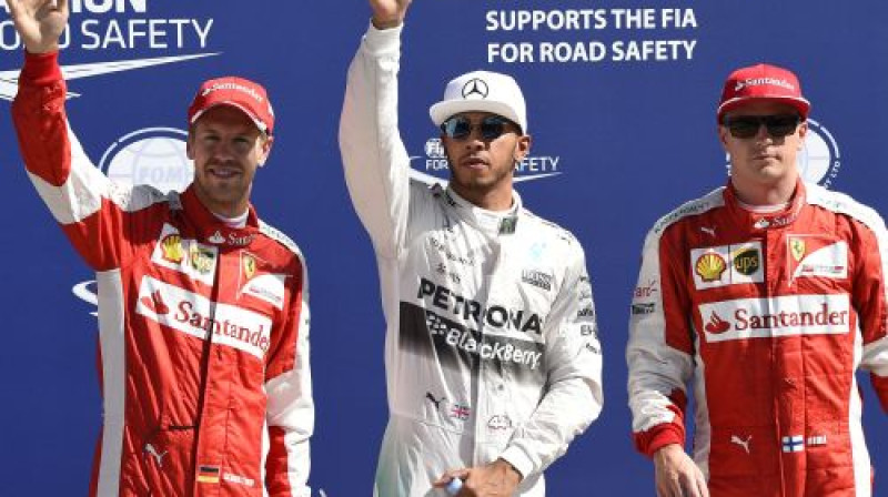 Itālijas GP kvalifikācijas pirmais trijnieks - Fetels, Hamiltons, Reikenens
Foto: AFP/Scanpix