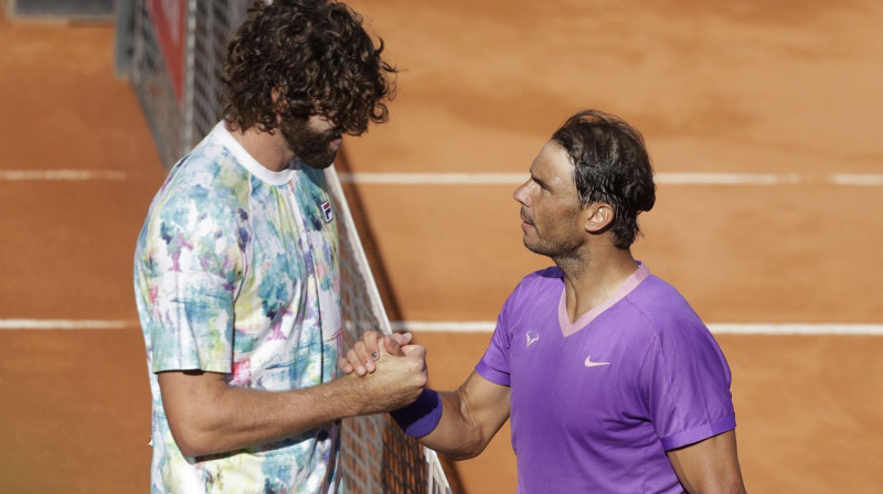 Railijs Opelka un Rafaels Nadals. Foto: AP/Scanpix