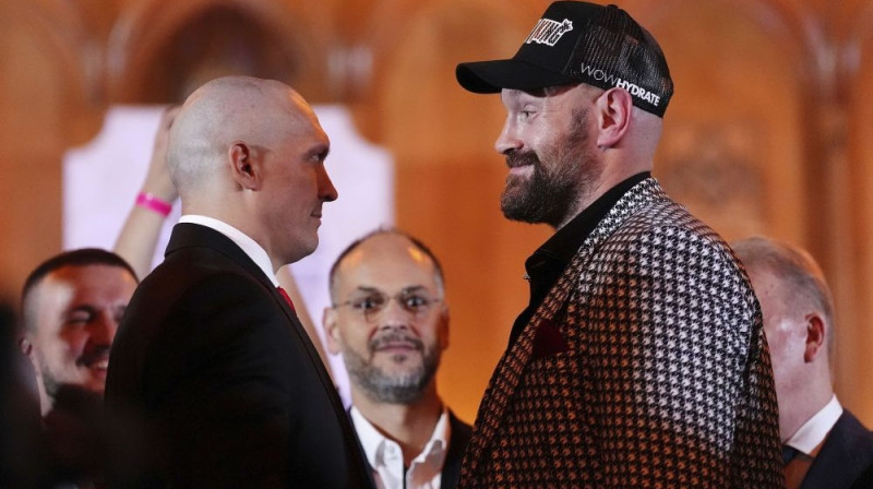 Oleksandrs Usiks un Taisons Fjūrijs Foto: AP/Scanpix